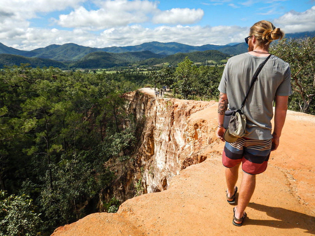 Hiker wearing Bedrock Sandals