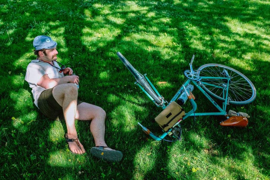 relaxing on green grass in sandals