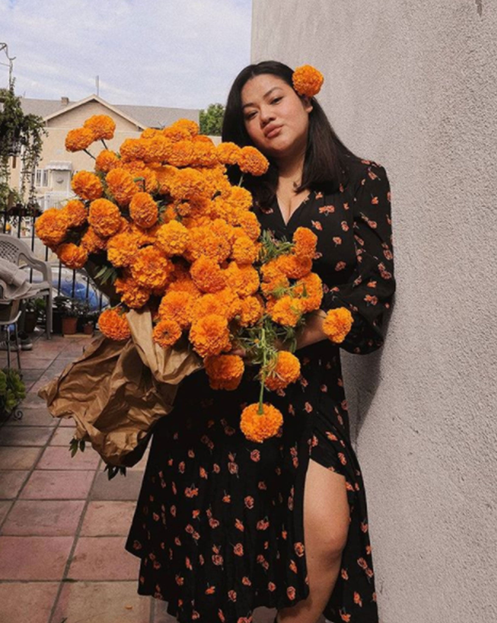 Valeria wears The Bergen Dress Extended in Persimmon Blossom