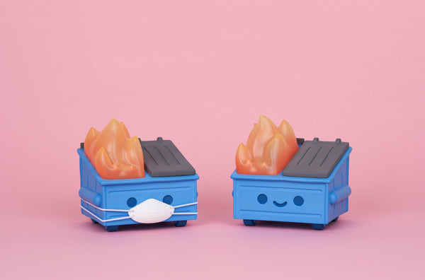 two 2020 Special Edition Dumpster Fire vinyl toys one with and one without a mask
