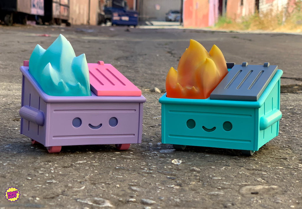 limited edition Dumpster Fire resin toy and original Dumpster Fir toy on the street 
