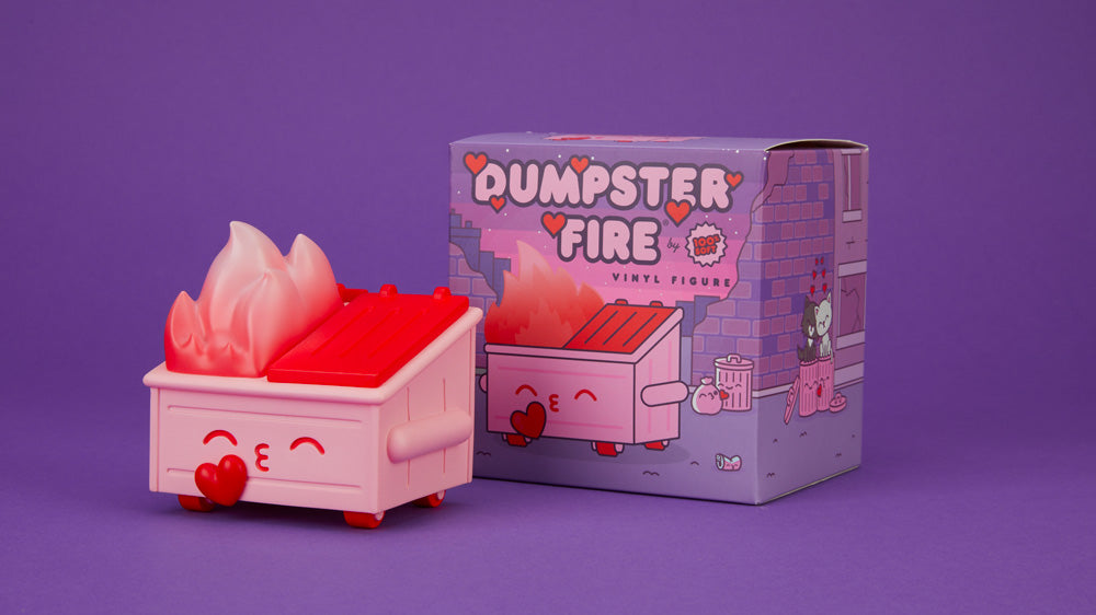 The Kiss Me, I'm Trash Dumpster Fire figure pictured with box