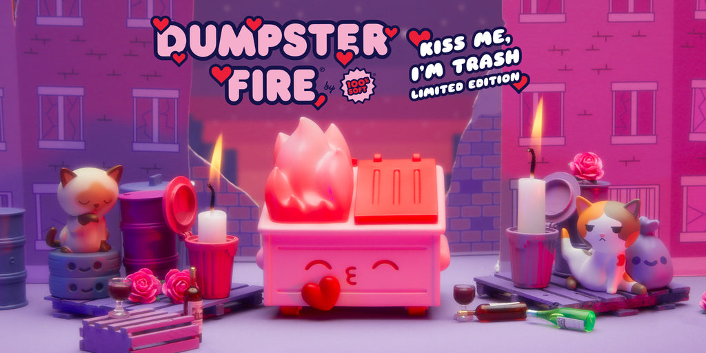 The Kiss Me, I'm Trash Dumpster Fire figure pictured in a romantic setting with trash kitty figures and candles