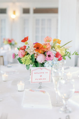 Table sign with flowers