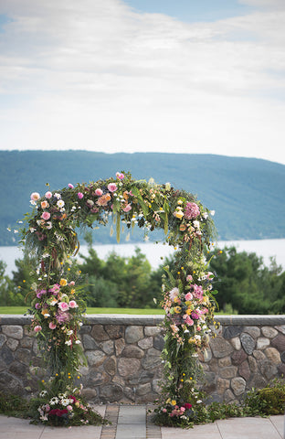 floral arbor with mountain background