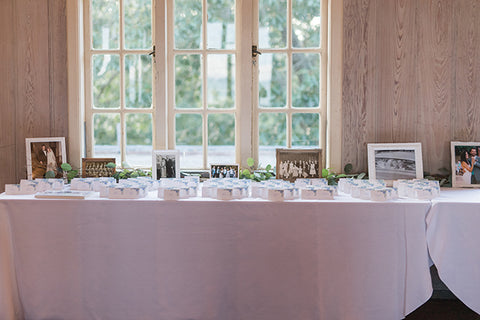reception table with hydrangea escort cards