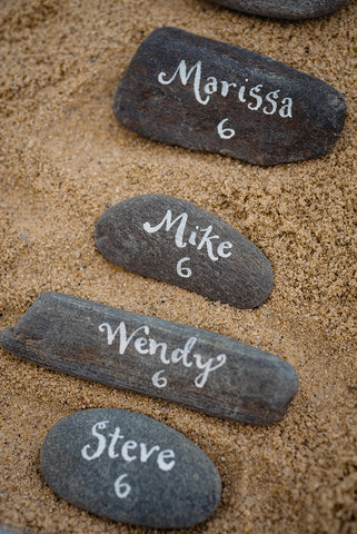 escort cards as rocks