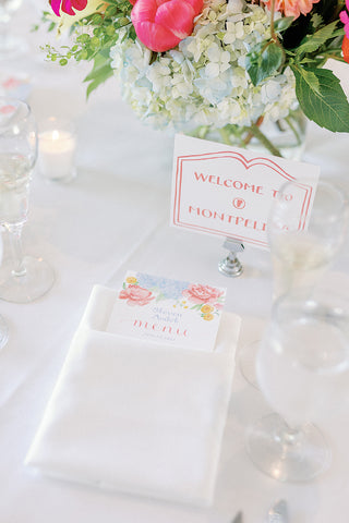 floral menu with guest name