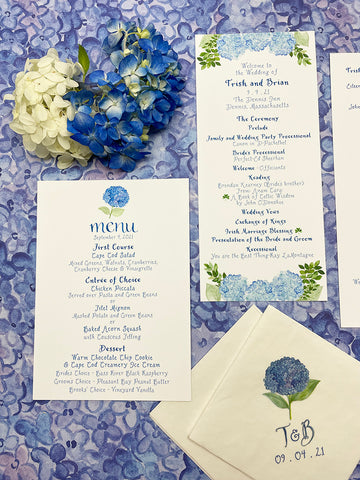 menu and napkins on hydrangea wrap