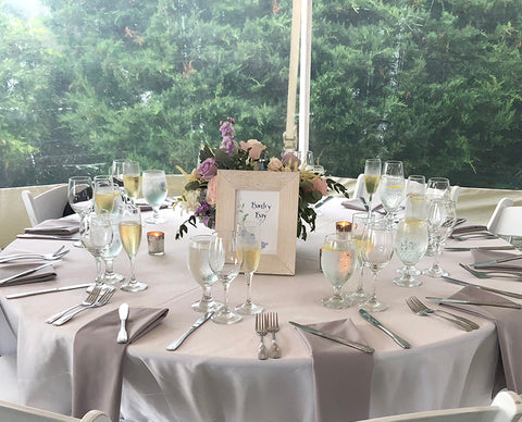 Lilac framed table name in calligraphy