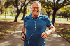 older man jogging outside