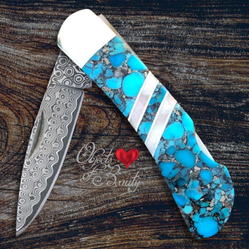 https://cdn.shopify.com/s/files/1/1133/7544/products/blue-kingman-nugget-turquoise-black-obsidian-3-damascus-knife-yellowstone-collection-knives-santa-fe-stoneworks-366813_1600x.jpg?v=1663376381