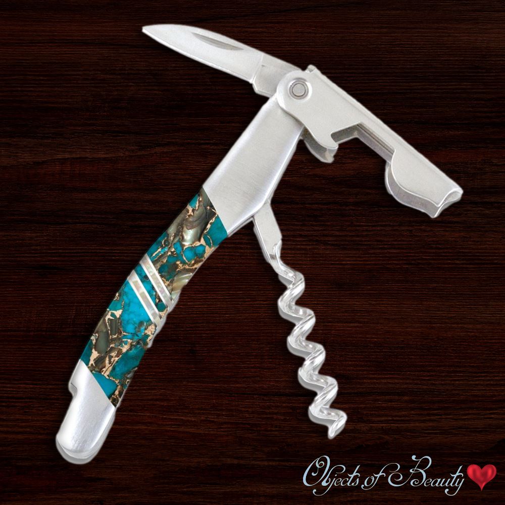 https://cdn.shopify.com/s/files/1/1133/7544/products/blue-kingman-turquoise-obsidian-w-bronze-and-mop-corkscrew-santa-fe-stoneworks-corkscrew-santa-fe-stoneworks-239275_2000x2000.jpg?v=1638571822