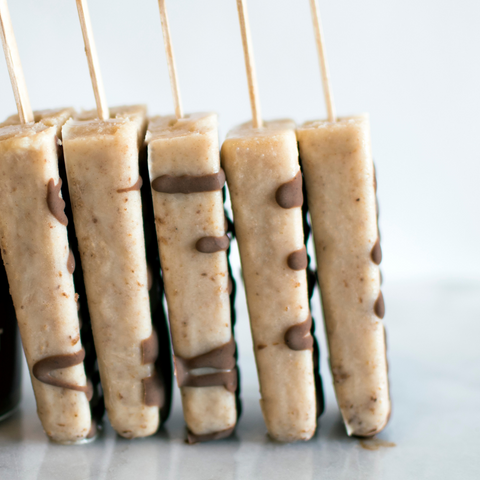 homemade ice cream pops drizzled with nut butter