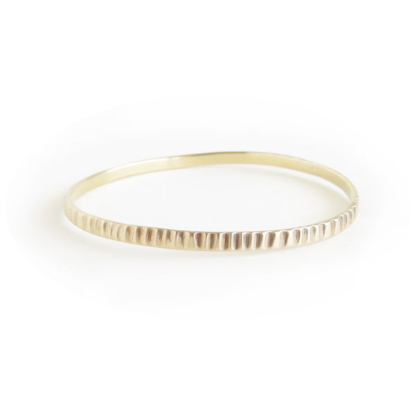 The Limpet Bangle in Brass