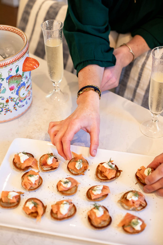 smoked salmon blinis for thanksgiving, wearing sailor stack for women and coral branch necklace