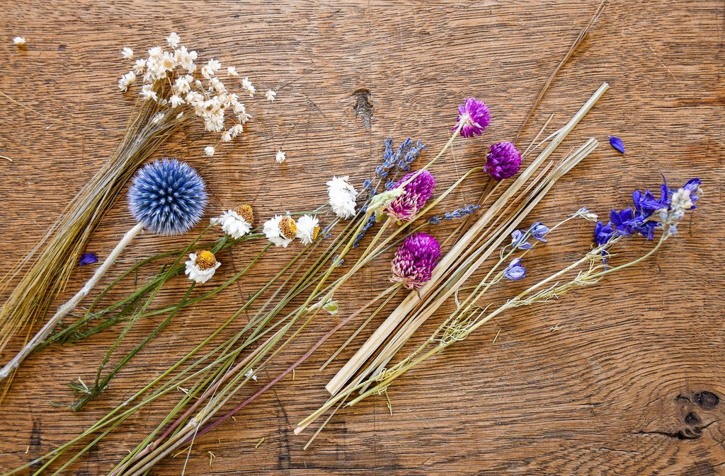 dried petite bouquet of flowers message in a bottle