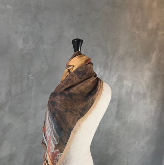 view of sacred stance scarf from back on dress form