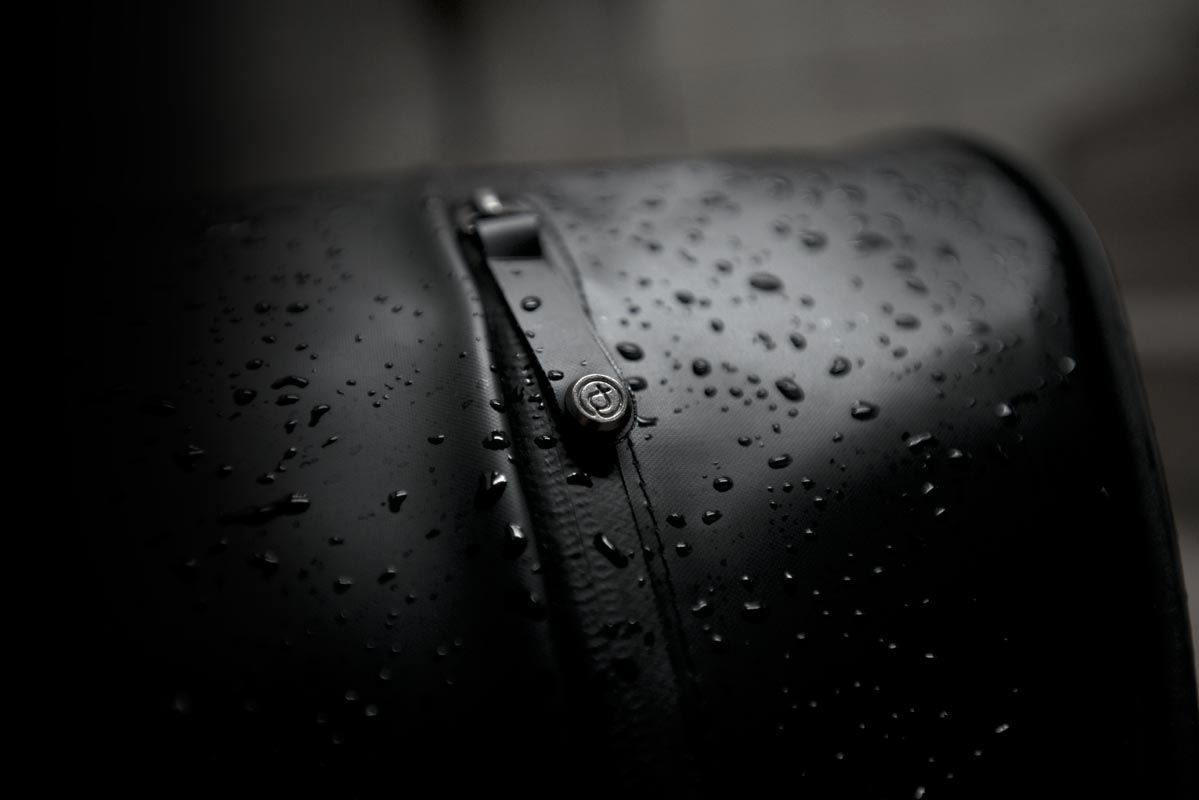 water-repellent messenger bag