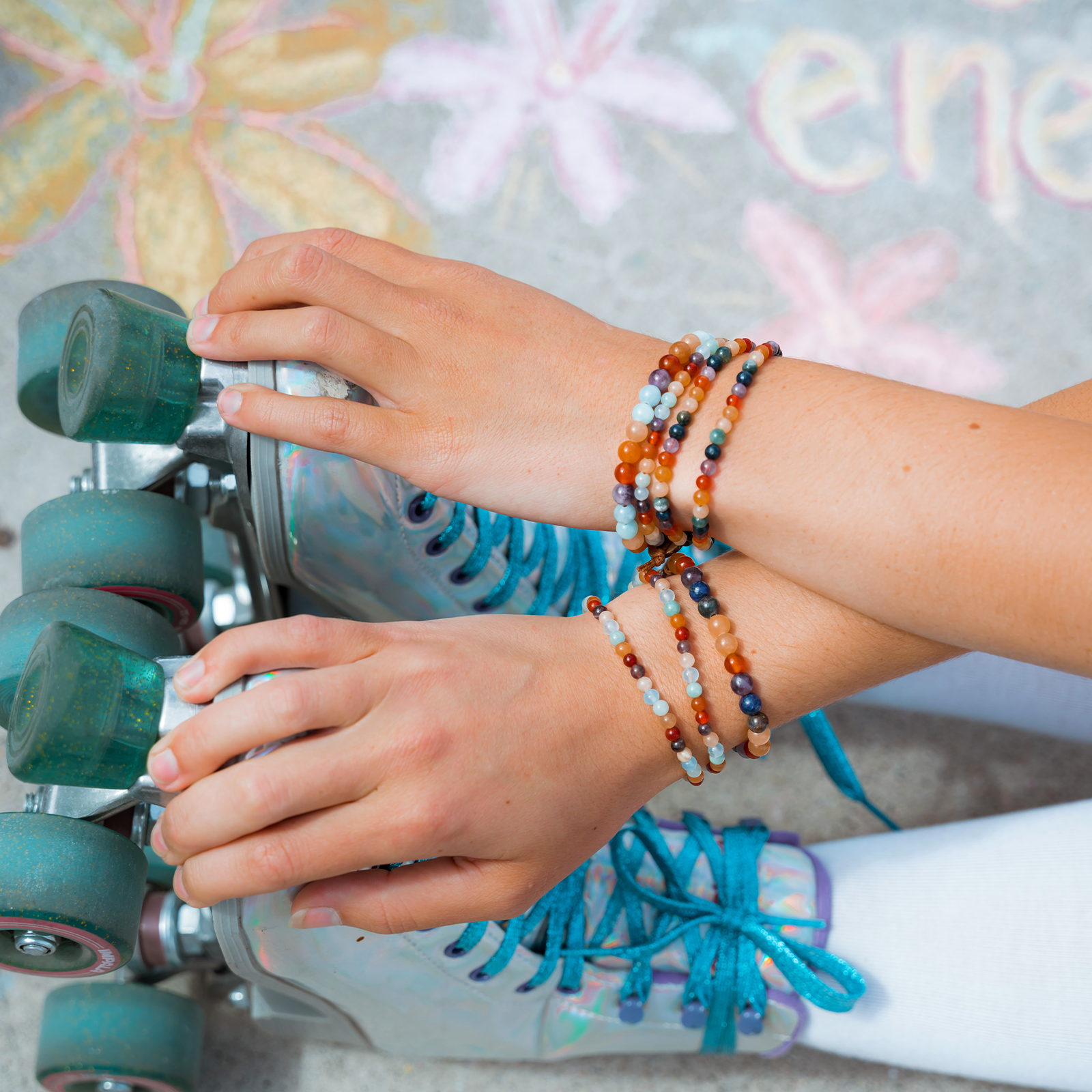 Colorful Healing Bracelets with Roller Skates in the Background