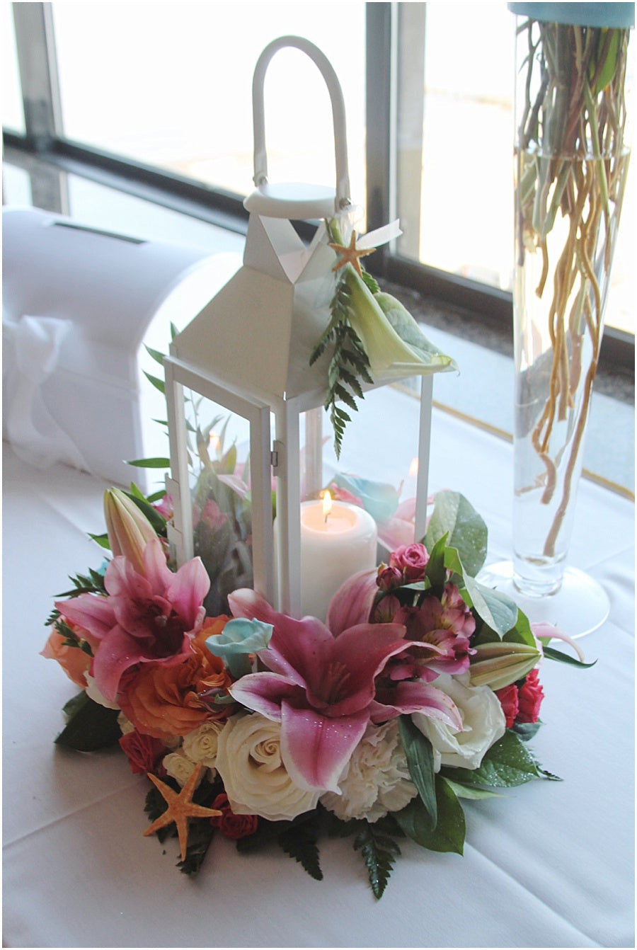 little miss lovely floral design // rehoboth beach de wedding salero ocean front wedding // tropical lily wedding flowers