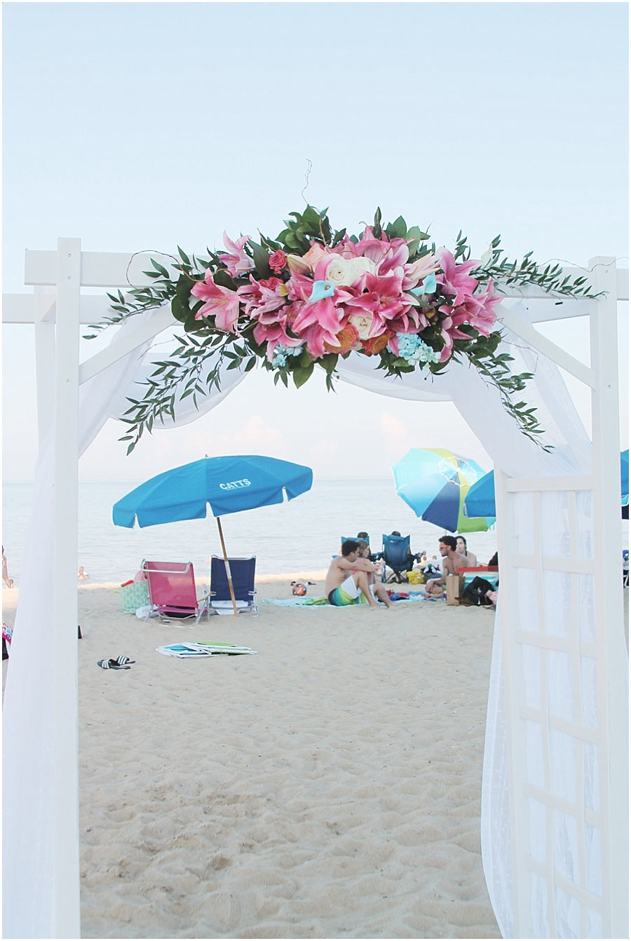 little miss lovely floral design // rehoboth beach de salero ocean front wedding // tropical lily wedding flowers