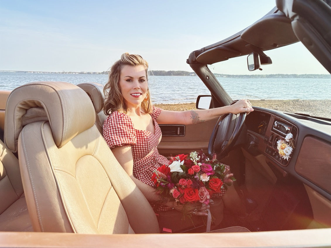 1994 classic saab 900 s covered in flowers // little miss lovely floral design ocean city maryland md wedding florist