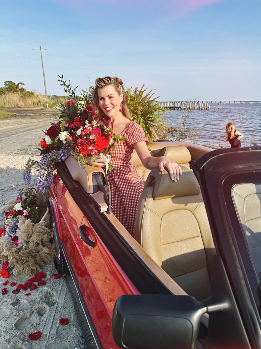 1994 classic saab 900 s covered in flowers // little miss lovely floral design ocean city maryland md wedding florist
