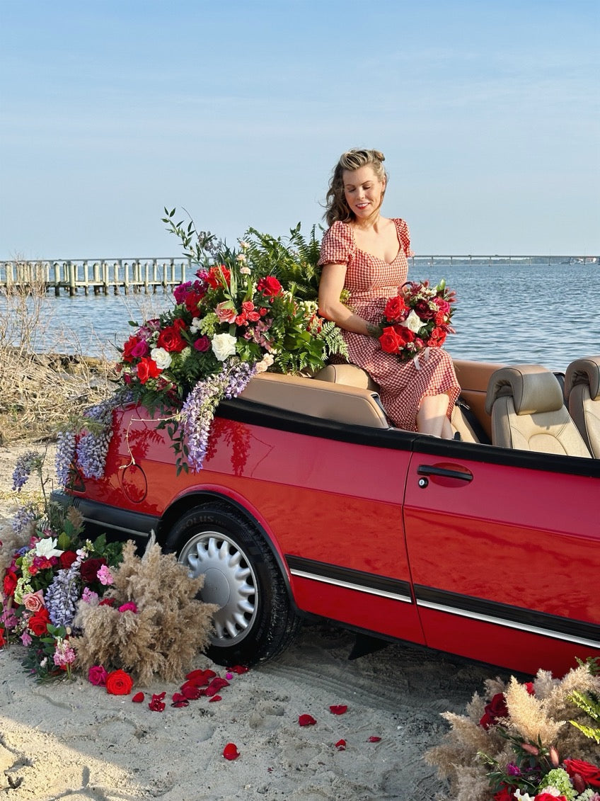 1994 classic saab 900 s covered in flowers // little miss lovely floral design ocean city maryland md wedding florist