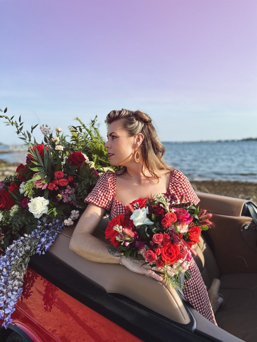 1994 classic saab 900 s covered in flowers // little miss lovely floral design ocean city maryland md wedding florist