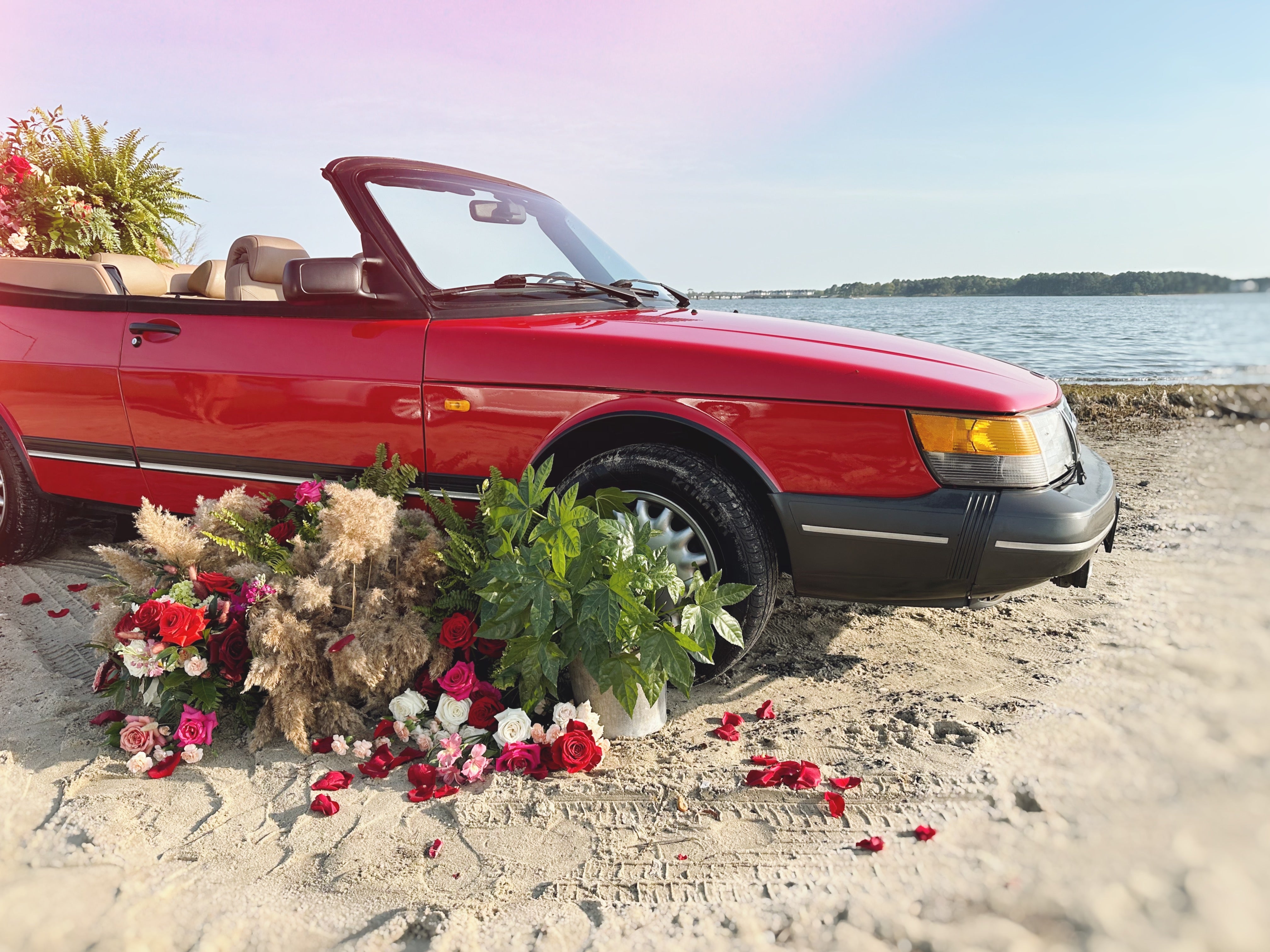 1994 classic saab 900 s covered in flowers // little miss lovely floral design ocean city maryland md wedding florist