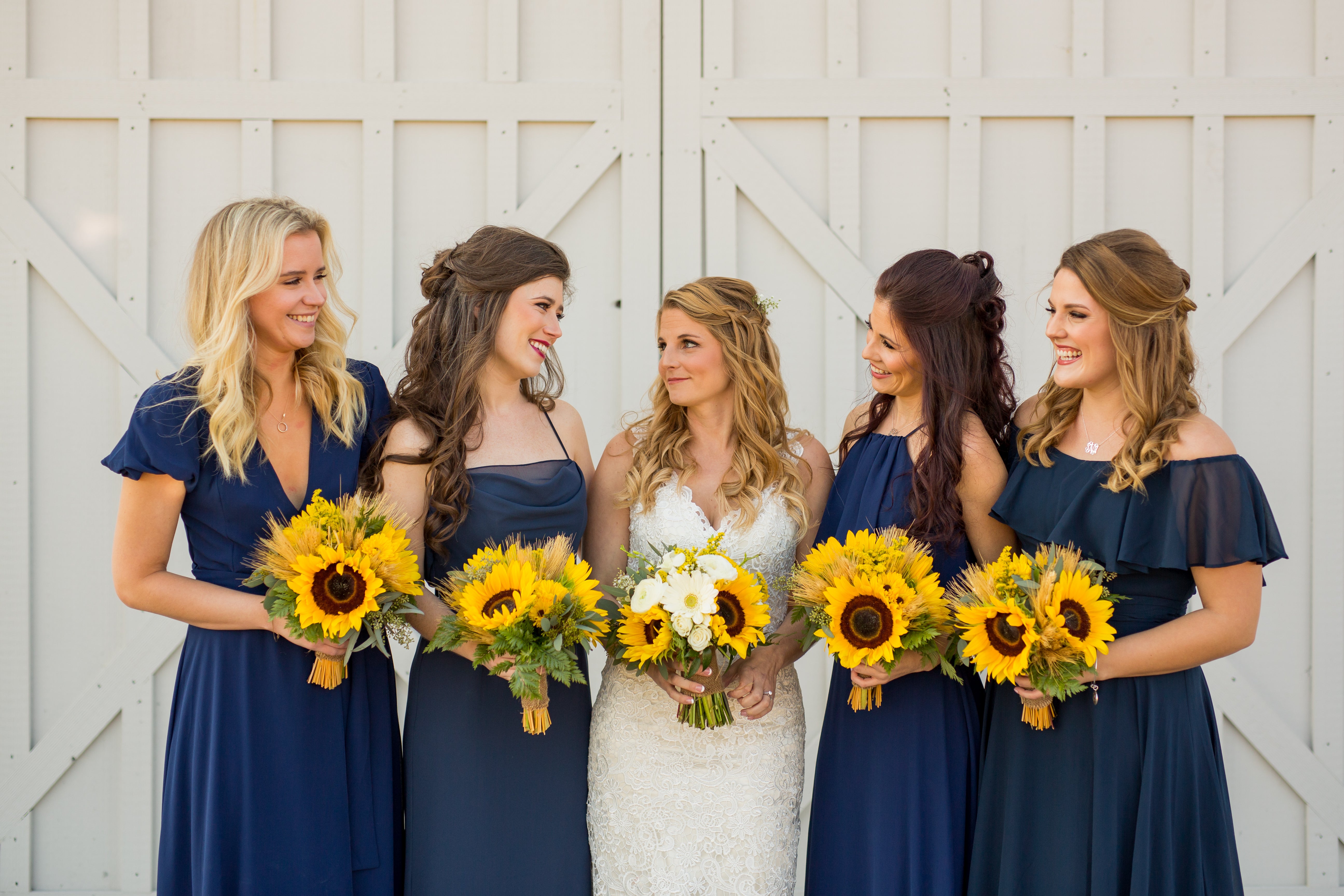 little miss lovely floral design // kylan barn delmar md wedding // rustic sunflower and white rose bouquets wedding flowers