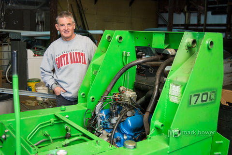 John Morris standing by his Mustang 1700