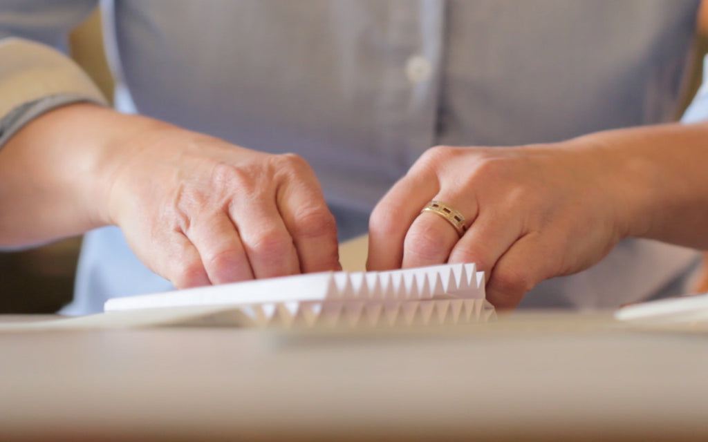 fabric into concertina card, the movement 