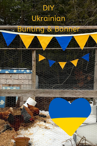 Winter chicken coop decorated with handmade yellow and blue bunting in support of Ukrainian.