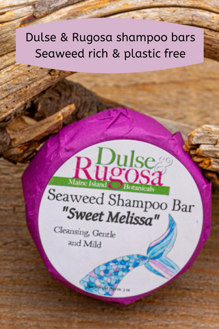 Image of a fuchsia wrapped shampoo bar with a illustration of a mermaid's tail, text Dulse & Rugosa's seaweed rich shampoo bars are plastic free