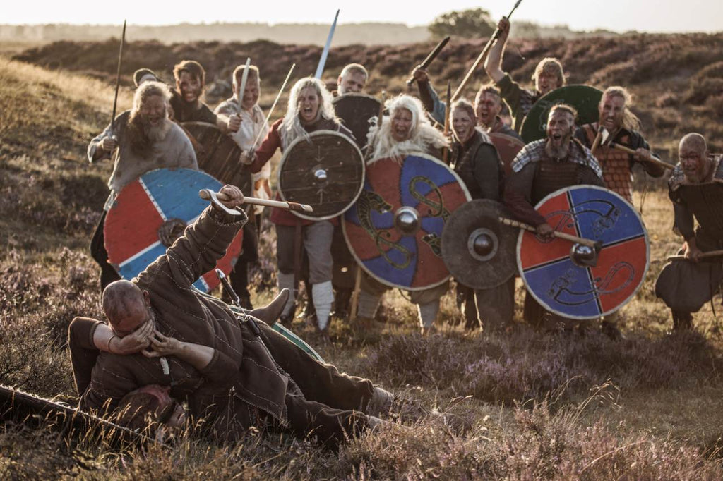 men fighting on the highland moors during a battle