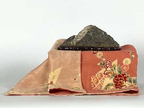 Suiseki Stone displayed with vintage Japanese Kimono Fabrics