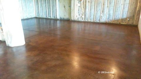 After concrete acid and sealer have been applied to the interior flooring