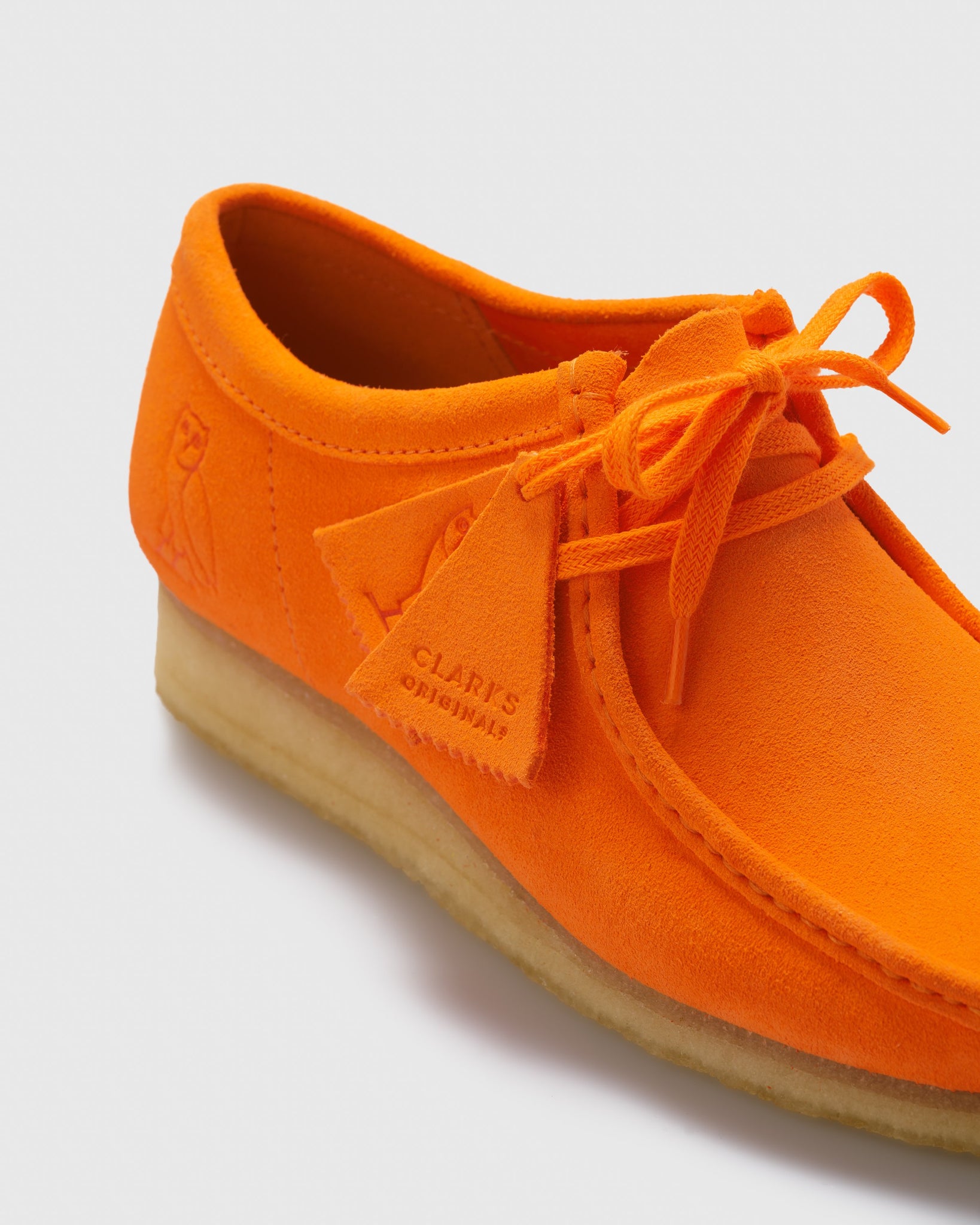 orange wallabee clarks