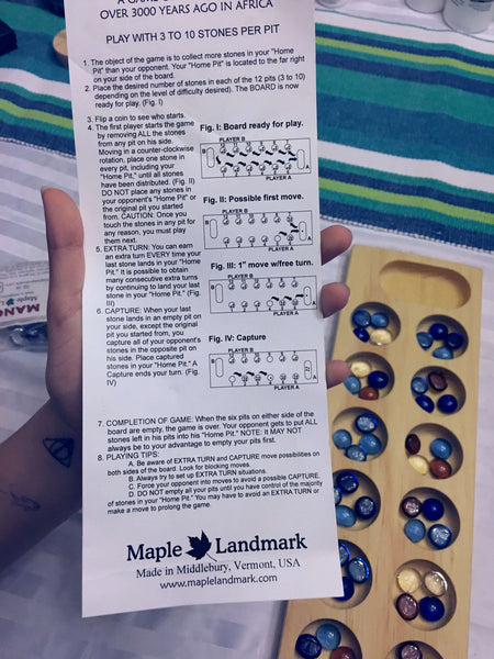 mancala playing piece crossword