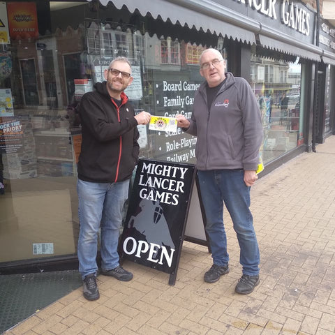 Mighty Lancer Games hobby and games shop getting their dog friendly business sticker