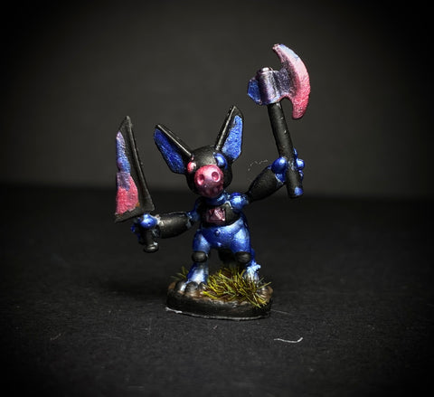 a small miniature for tabletop gaming of a robot kobold painted in blue and pink metallics by a child