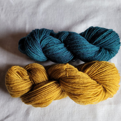 Blue skein is 15% Cotswold and 85% Dorset; Gold skein is 30/70 blend