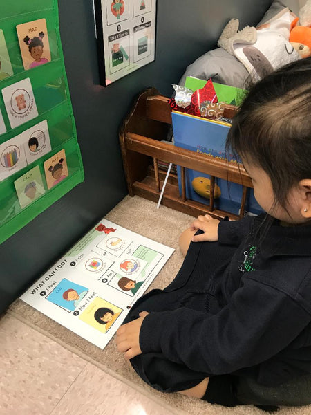 Young child using an Activity Mat for regulation of emotions