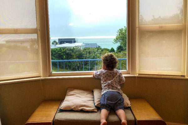 Boy looking out the window