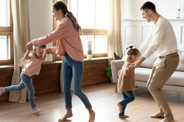 Family dancing to work through emotions