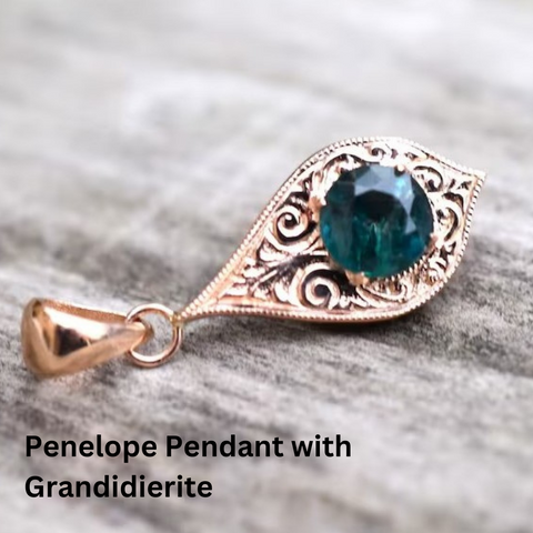 Engraved antique pendant with grandidierite gem