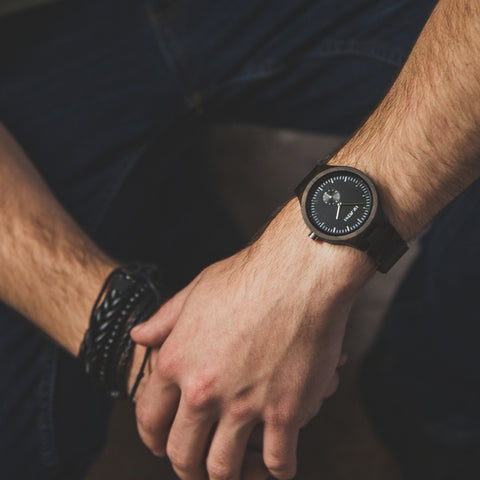 wooden watch on a man's wrist