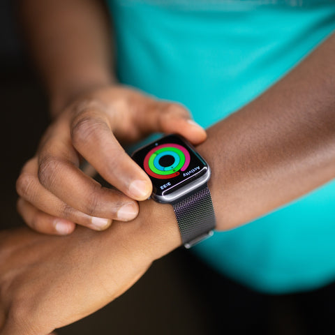 activity rings shown on apple watch on wrist